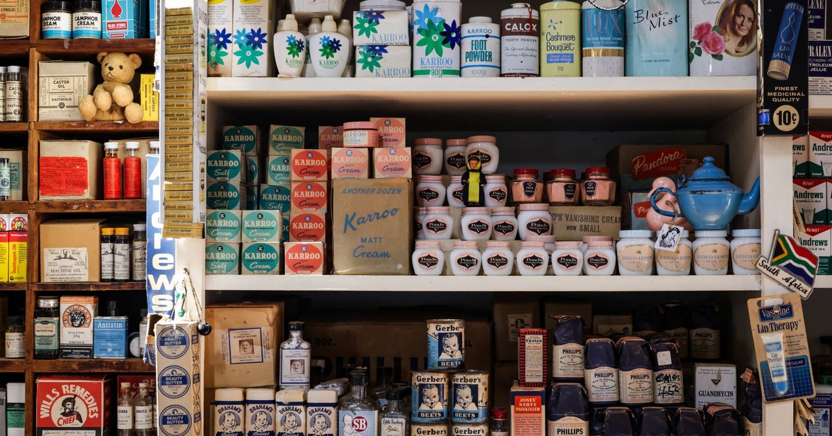 Retro grocery store shelves filled with vintage packaging and products.
