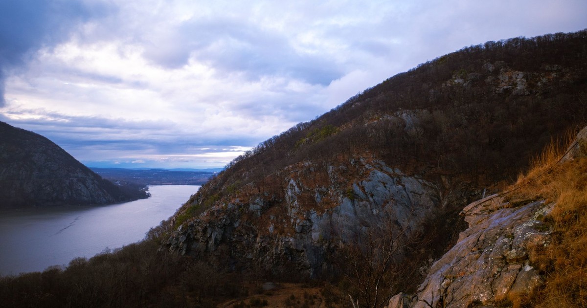 Breathtaking view of the Hudson River flanked by lush hills in Cold Spring, NY.