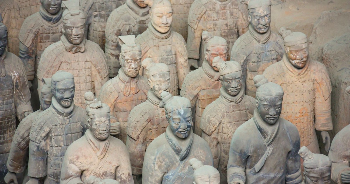 Close-up view of the ancient Terracotta Army statues in Xi'an, showcasing historical artistry.