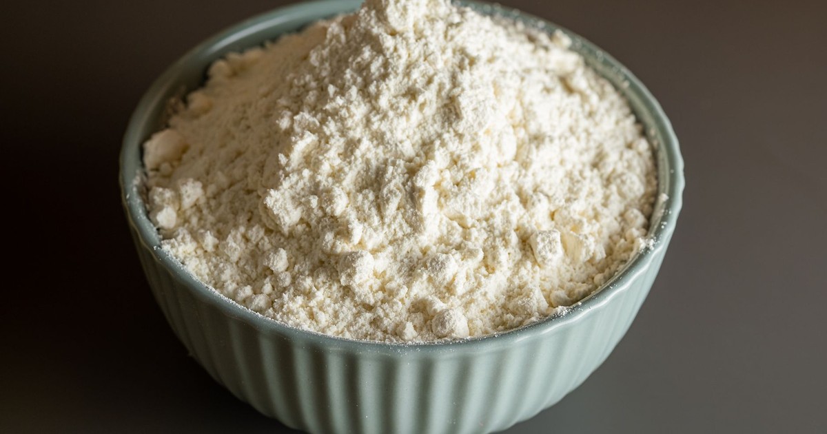 Close-up of a bowl filled with flour, perfect for culinary and baking themes.