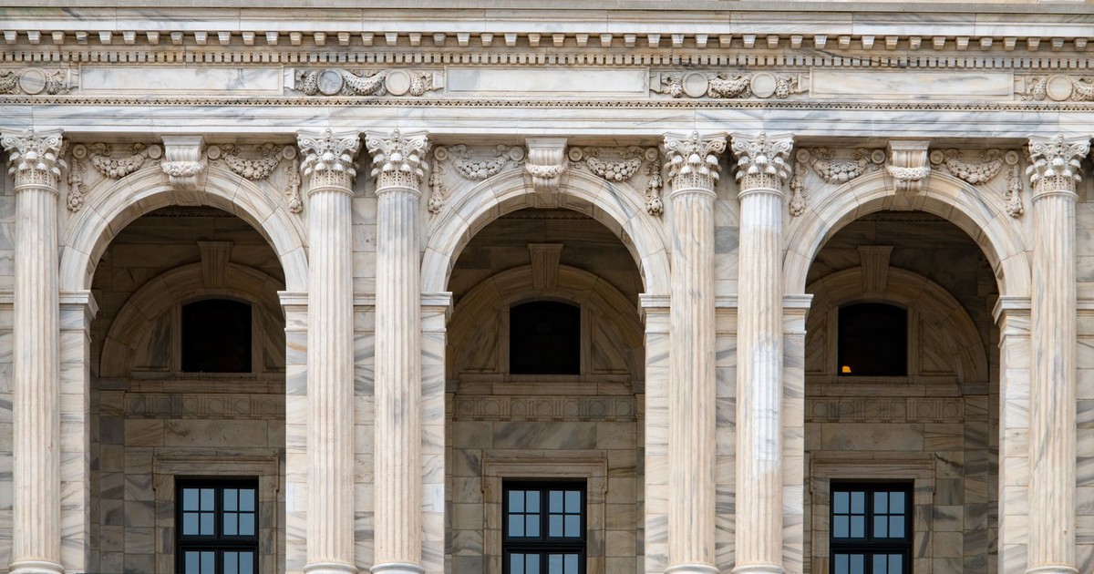 Close-up of the ornate archways and columns at the Minnesota State Capitol building.