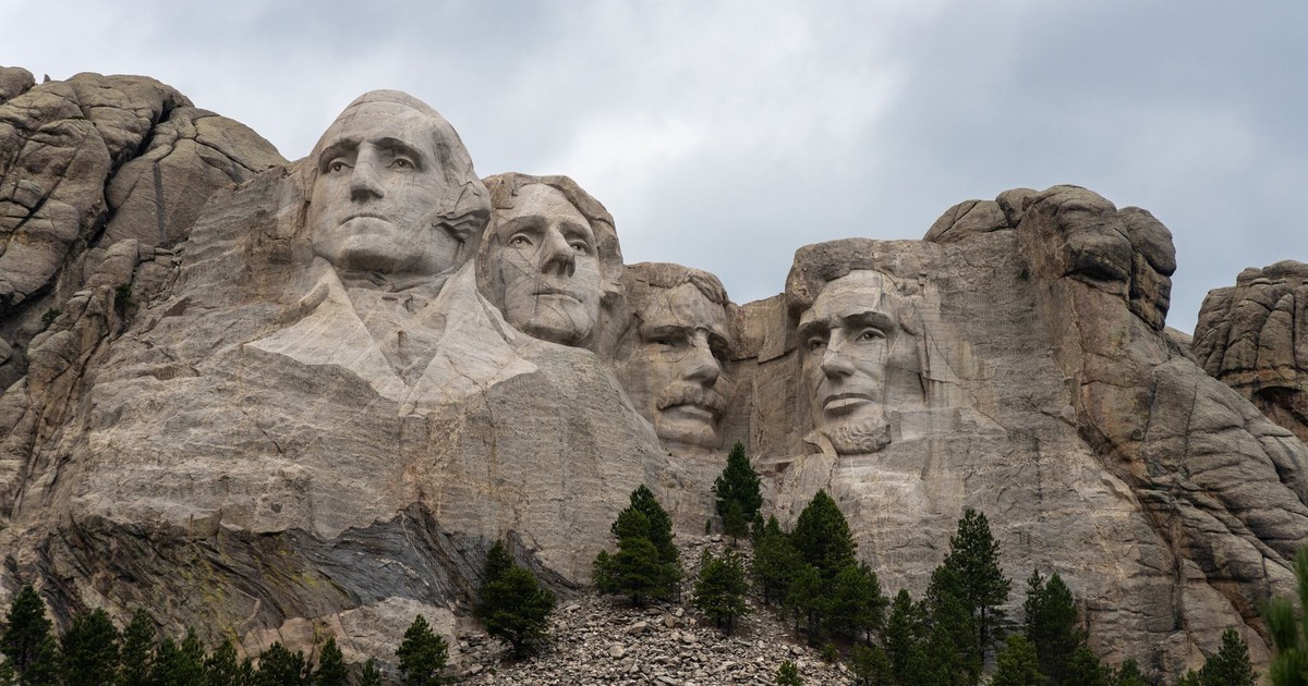 A striking view of Mount Rushmore featuring the carved faces of U.S. Presidents in the Black Hills of South Dakota.