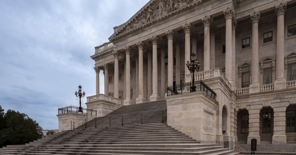 Majestic view of the Capitol Building's colonnade and steps in Washington DC, USA.