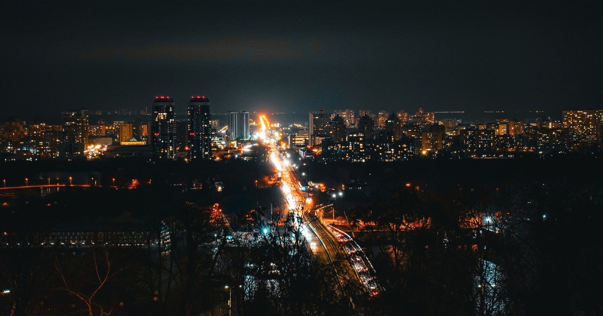 Stunning nighttime city view of Kyiv, Ukraine showcasing urban lights and vibrant streets.
