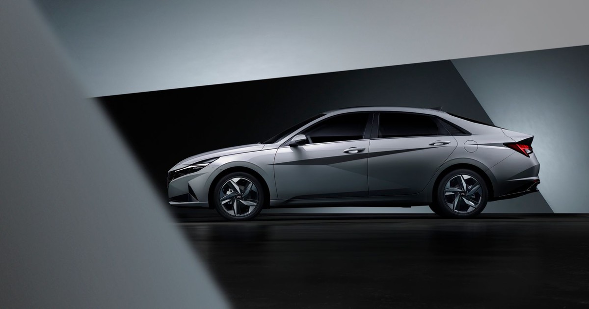 Modern Hyundai sedan showcased in a dark studio environment.