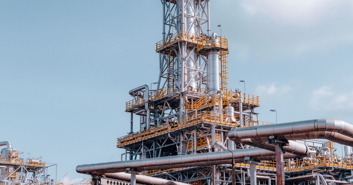 View of a large oil refinery plant with intricate pipelines in Trzebinia, Poland.