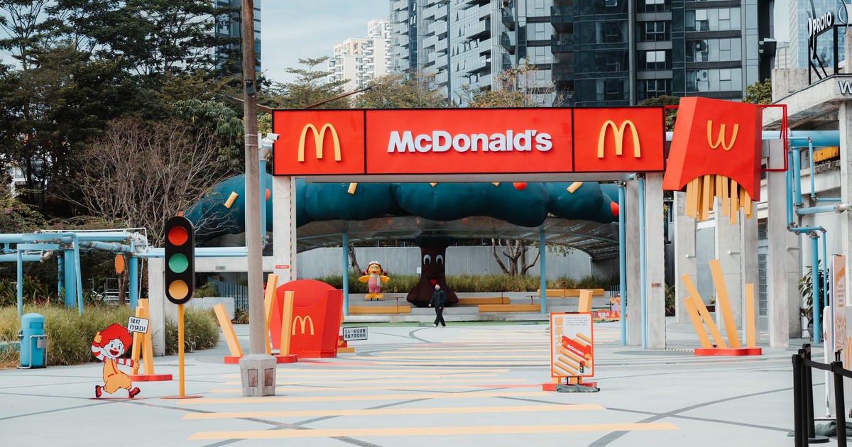 Colorful urban setting featuring a McDonald's restaurant entrance with playful decor.
