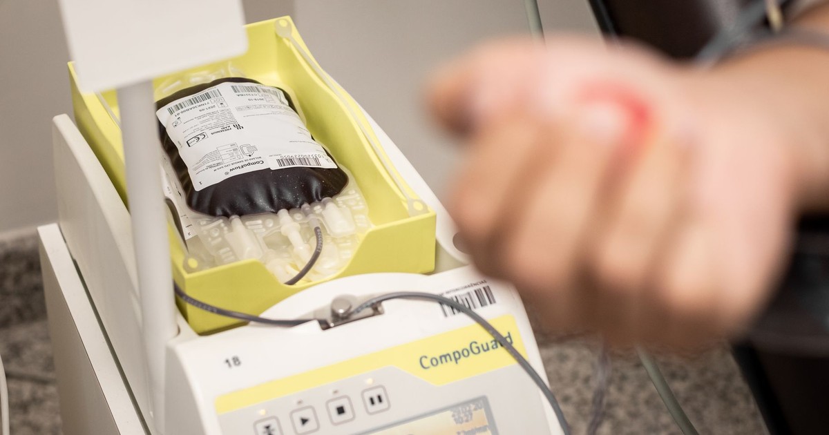 Close-up of blood collection equipment during a donation process in a medical facility.