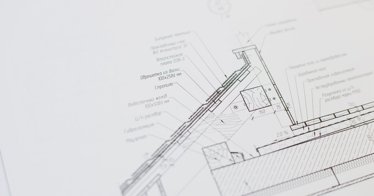 Close-up of a detailed architectural floor plan focusing on technical elements and design specifications.