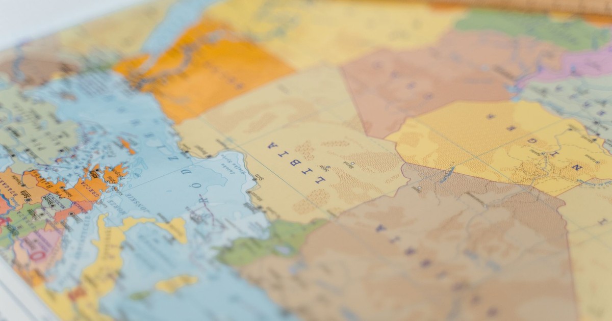 Colorful world map close-up showing African countries with focus on Libya and surrounding areas.