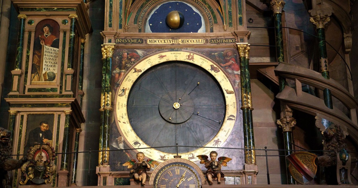 Close-up of Strasbourg Cathedral's renowned astronomical clock with intricate details.