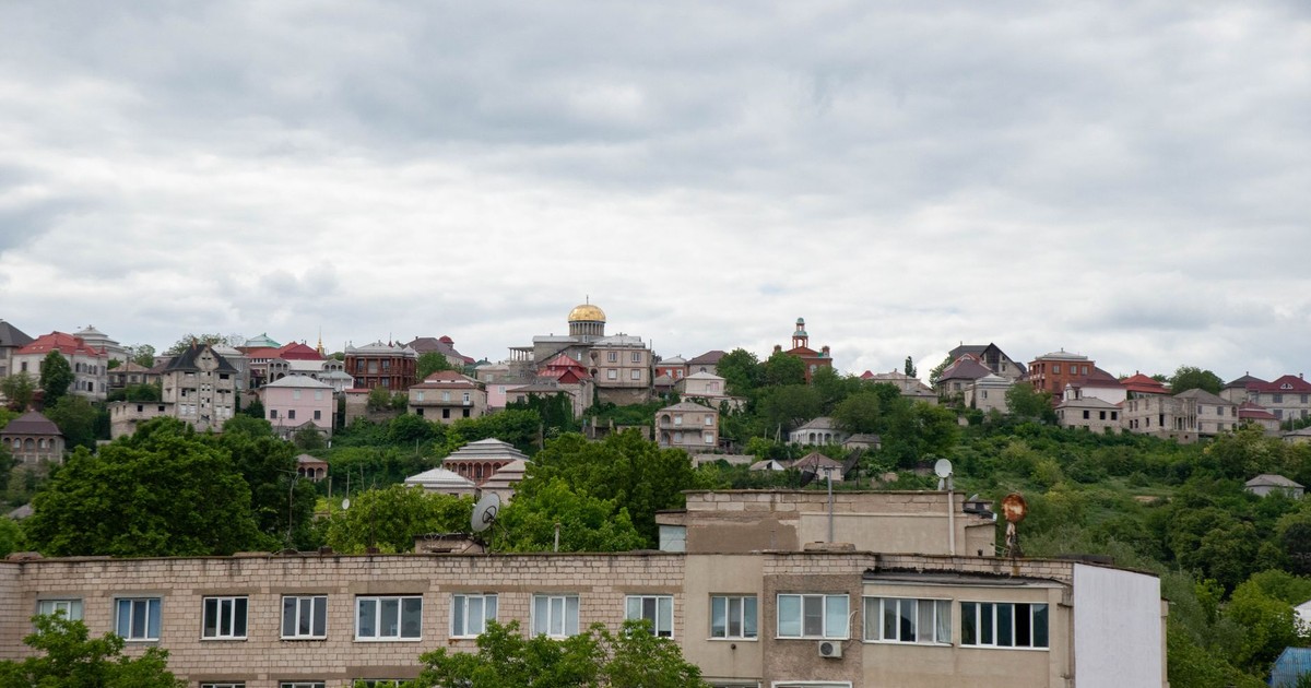 Charming vista of residential buildings in Soroca, Moldova, under a cloudy sky.