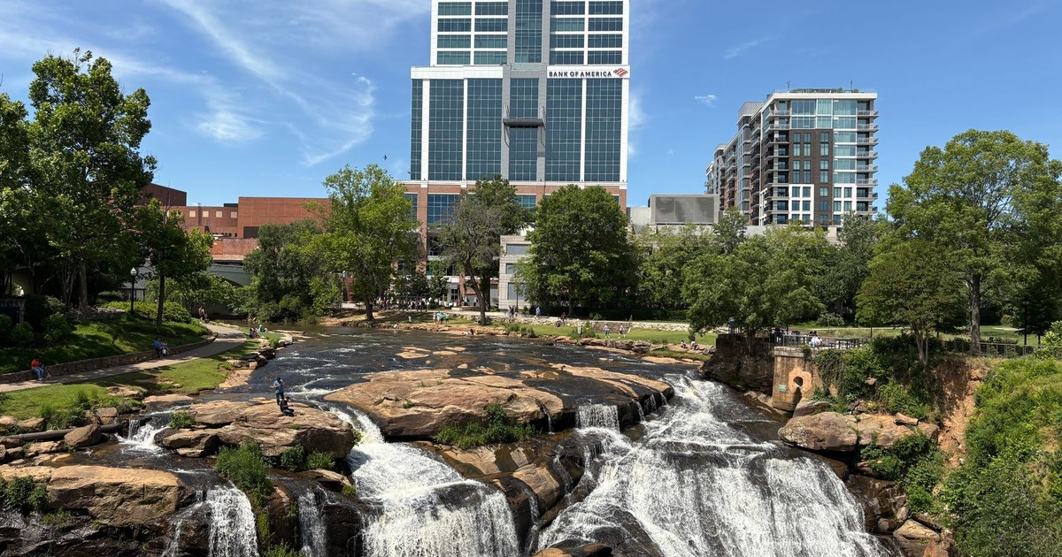 View of downtown Greenville with Reedy River Falls, a unique blend of nature and urban landscape.