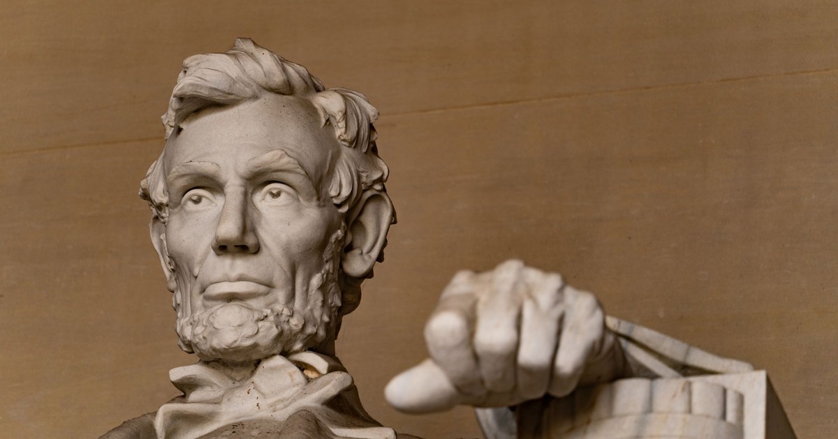 Detailed view of the Lincoln Memorial in Washington D.C., capturing the iconic statue's expression and posture.