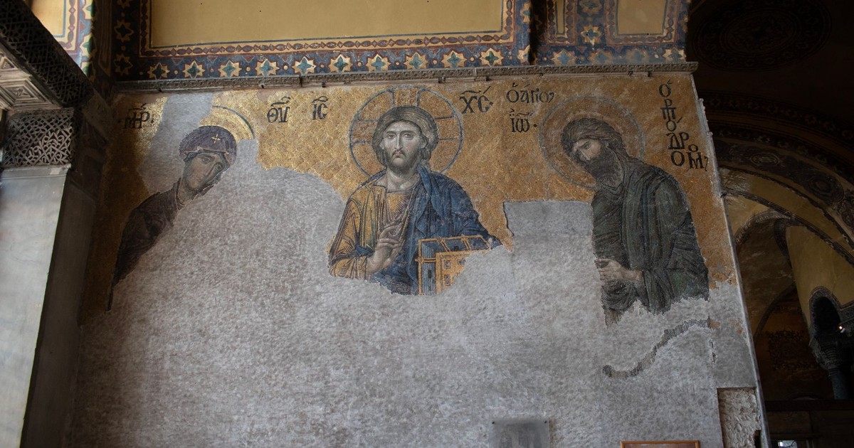 Byzantine mosaic in Hagia Sophia, Istanbul depicting religious figures in intricate detail.