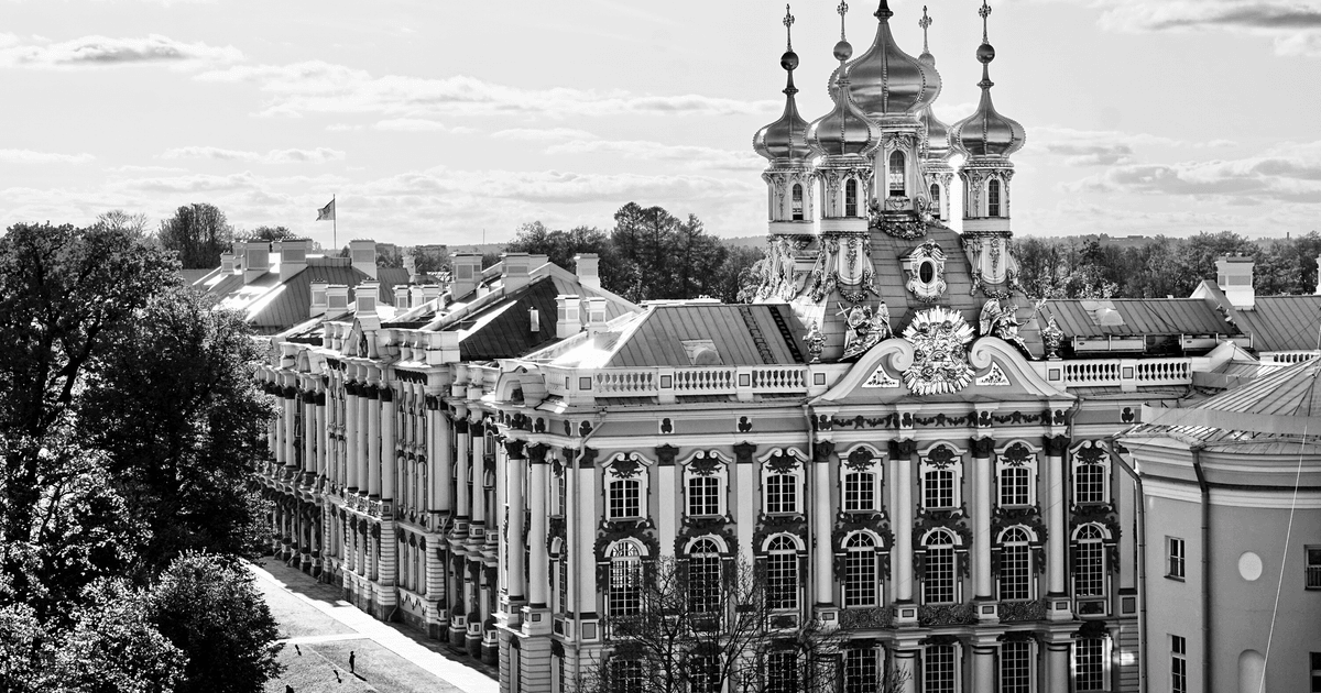 A striking black-and-white image of the ornate Catherine Palace showcasing its Baroque architecture.