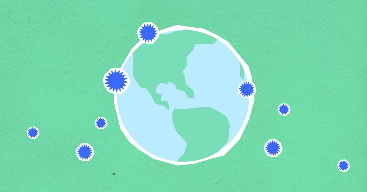 Top view of decorative paper illustration of Earth with round shaped microbes diffusing during COVID 19 pandemic on green background