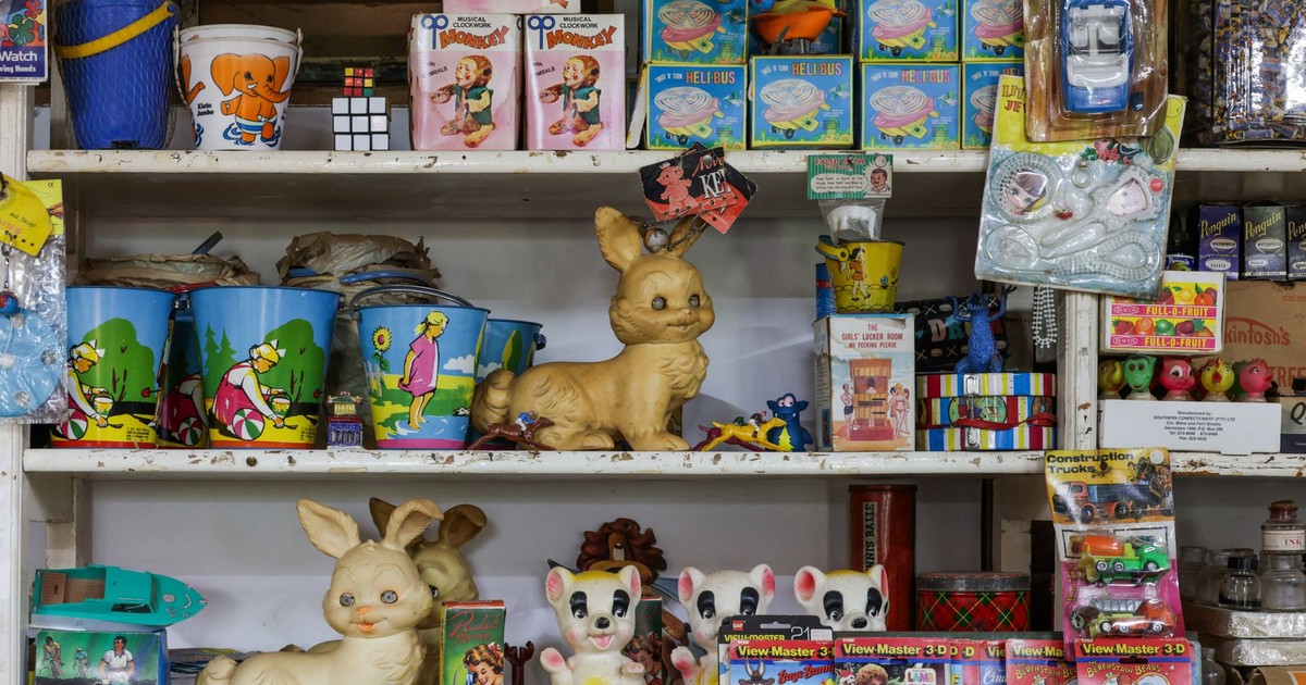 Colorful vintage toys and games on a shop shelf, evoking nostalgia and a retro vibe.