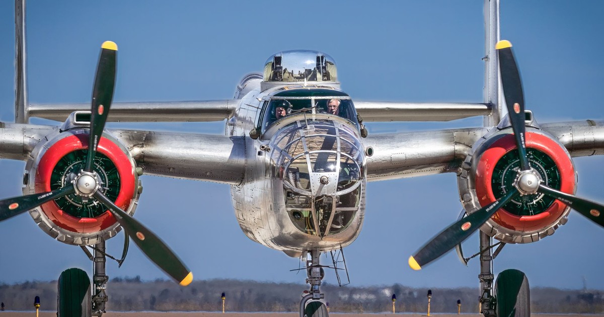 Historic B-25 Mitchell bomber on a bright day in Colorado Springs, showcasing its iconic design.
