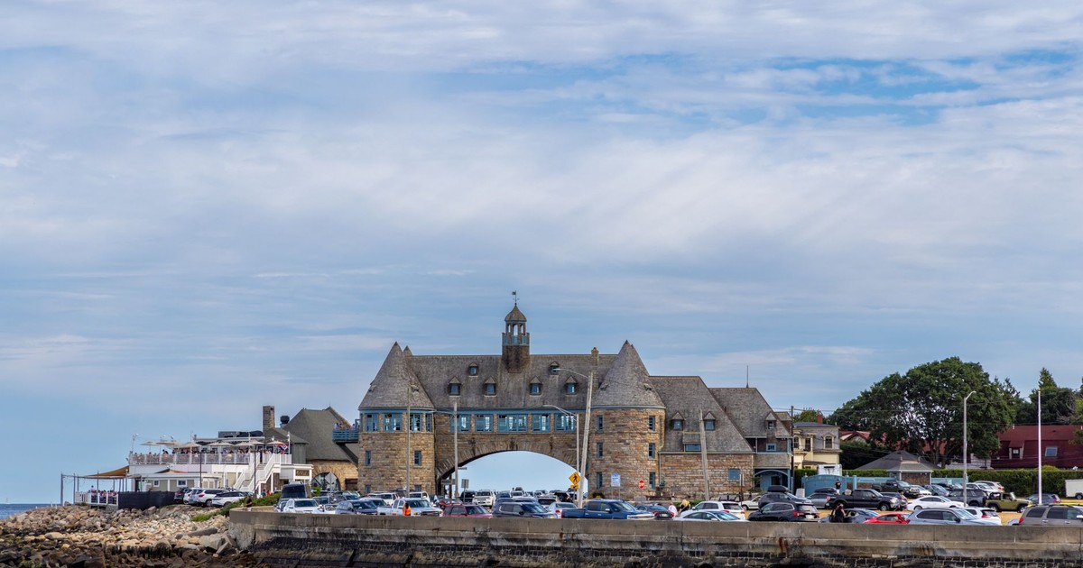 Charming coastal view of The Towers amid serene blue skies in New Shoreham, Rhode Island.