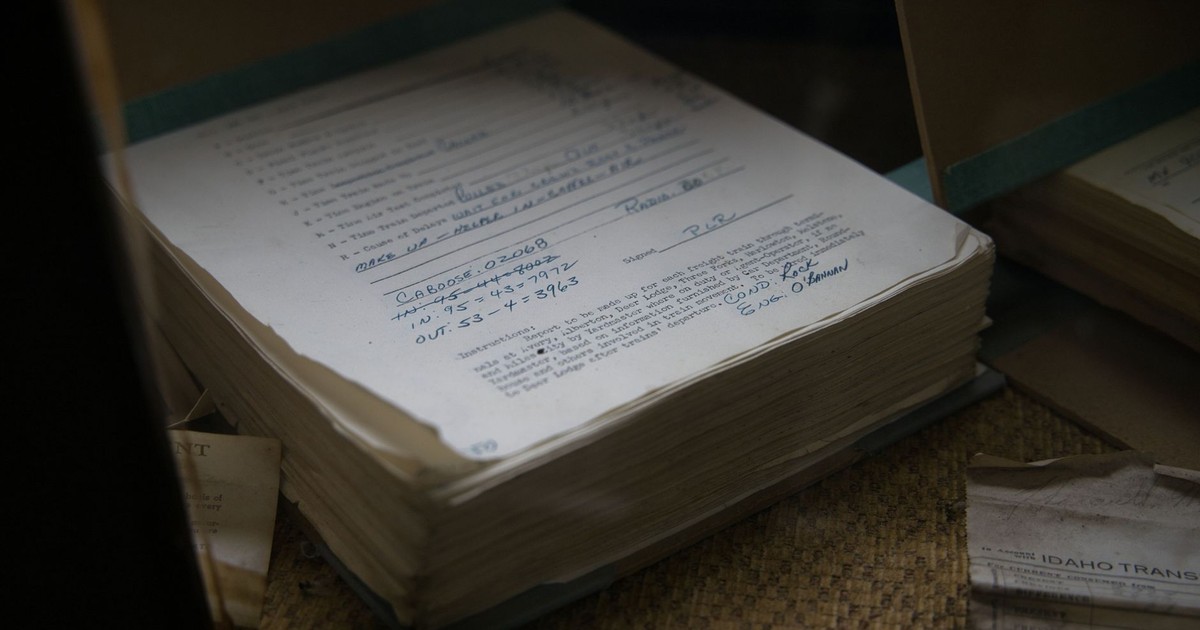 Old railroad papers in Avery, Idaho showcasing historical records and transportation details.