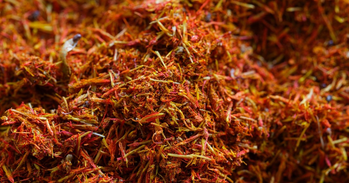Close-up of vibrant saffron threads showcasing exotic colors and texture.
