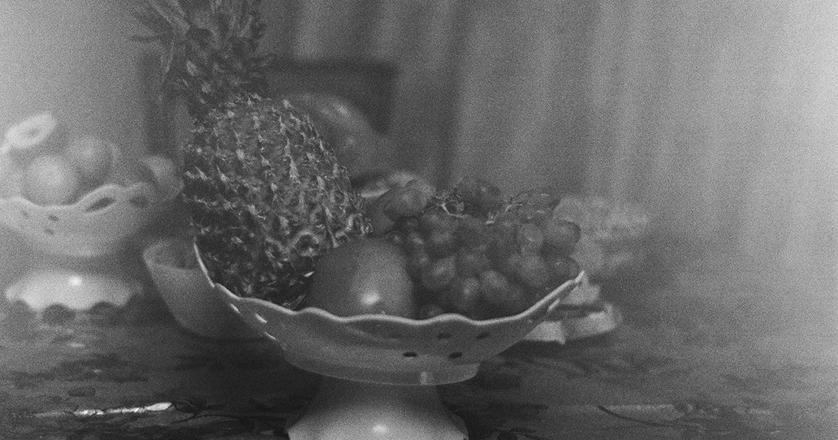 pineapple in fruit bowl on table