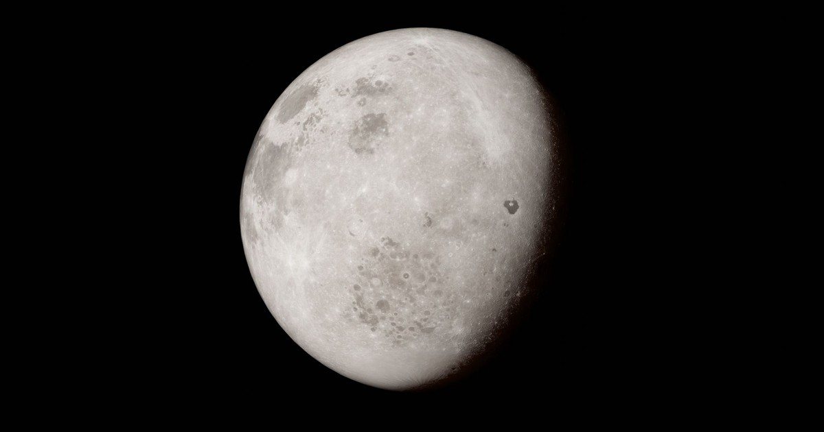 A detailed image of the moon's surface showing its unique craters and textures against a black background.