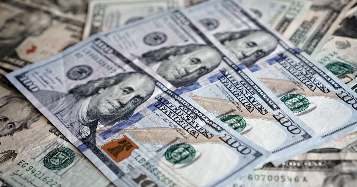 Close-up of various US dollar bills highlighting finance and economy.