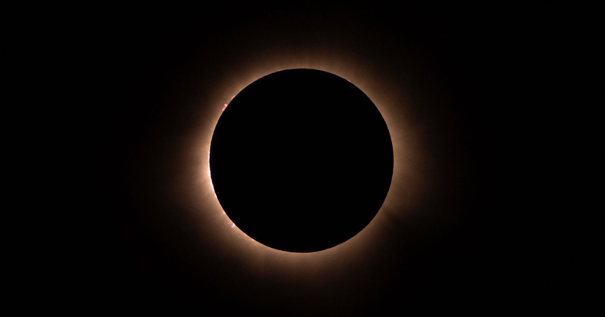 Stunning image of a total solar eclipse with glowing corona.